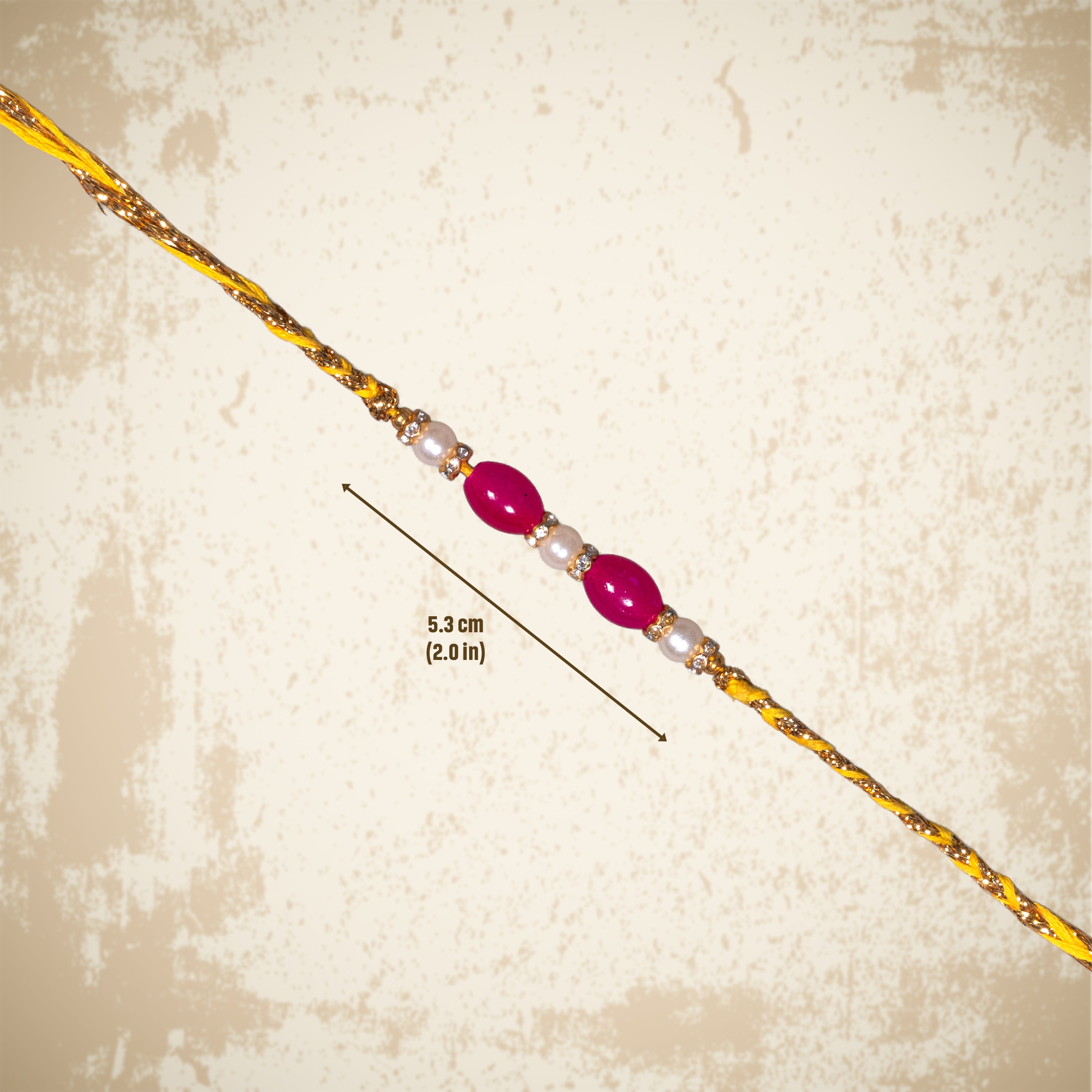 Handmade Rakhi - Ruby Pearl 1pc
