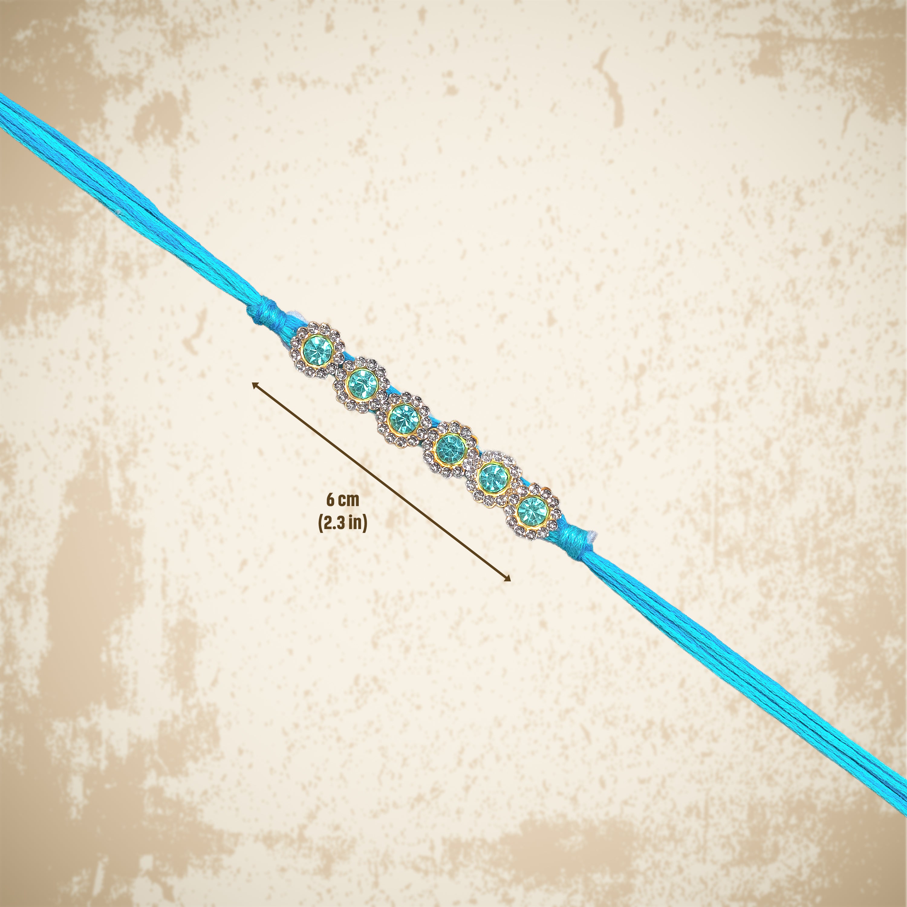 Handmade Rakhi - Turquoise Jewel
1pc